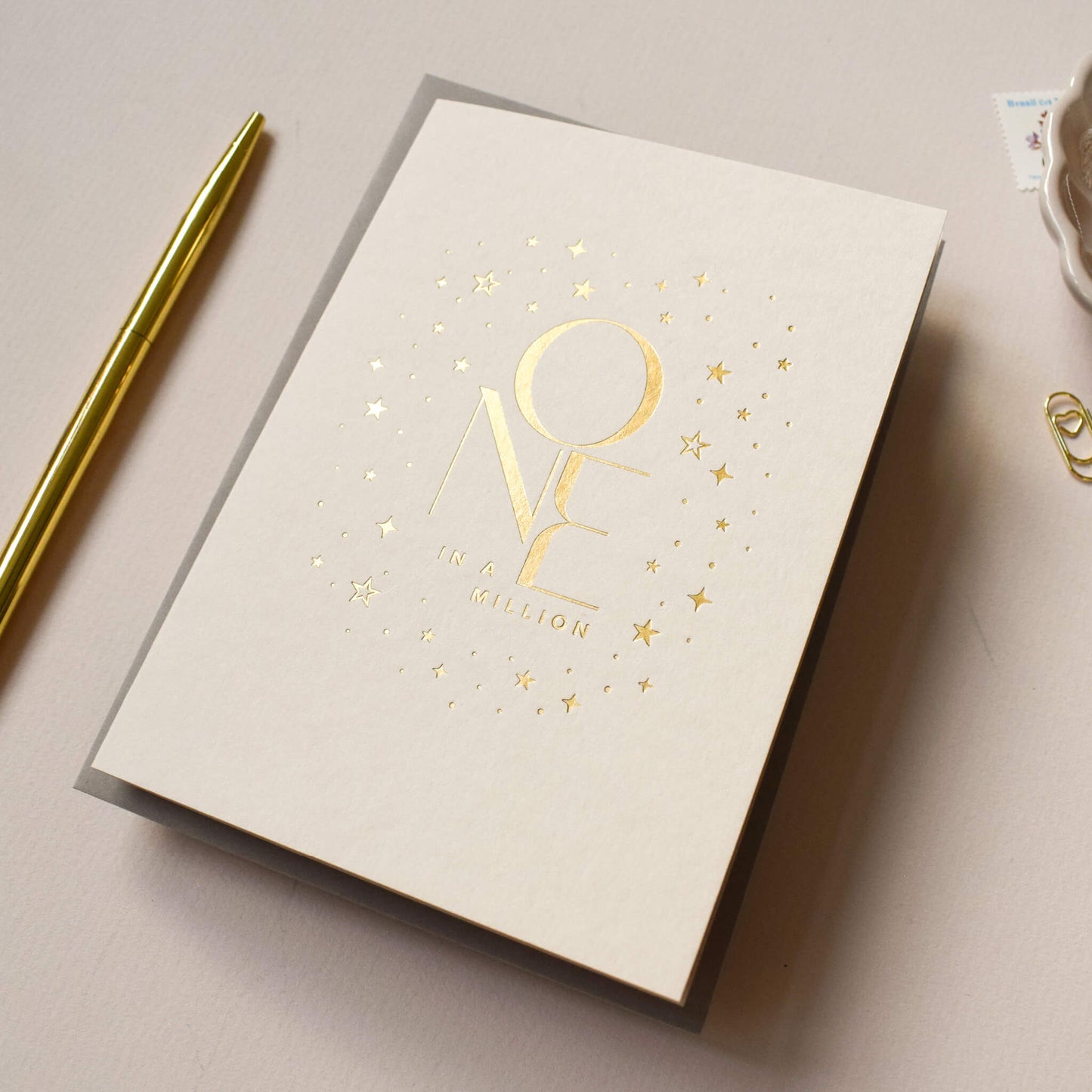 One In A Million Card in Gold Foil