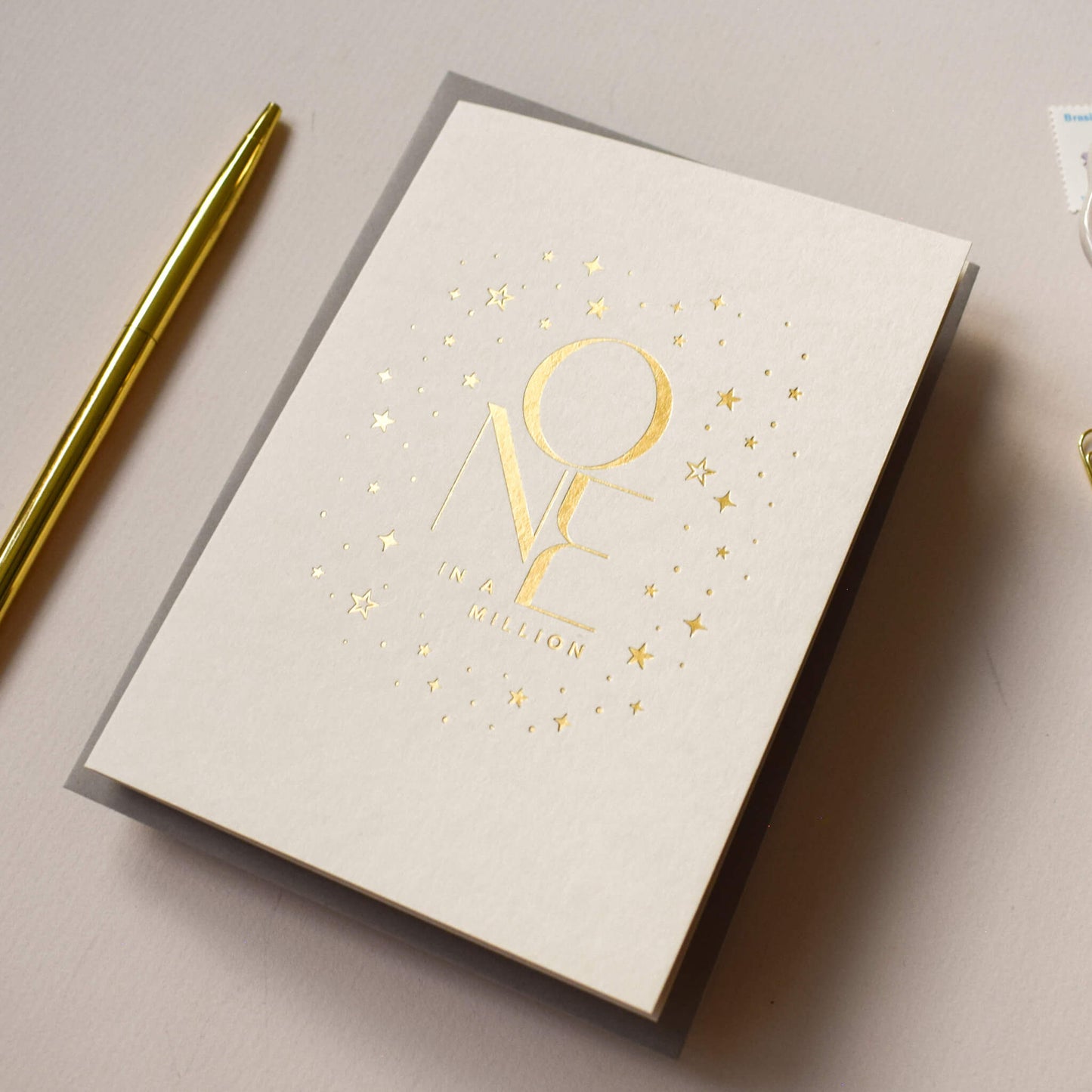 One In A Million Card in Gold Foil