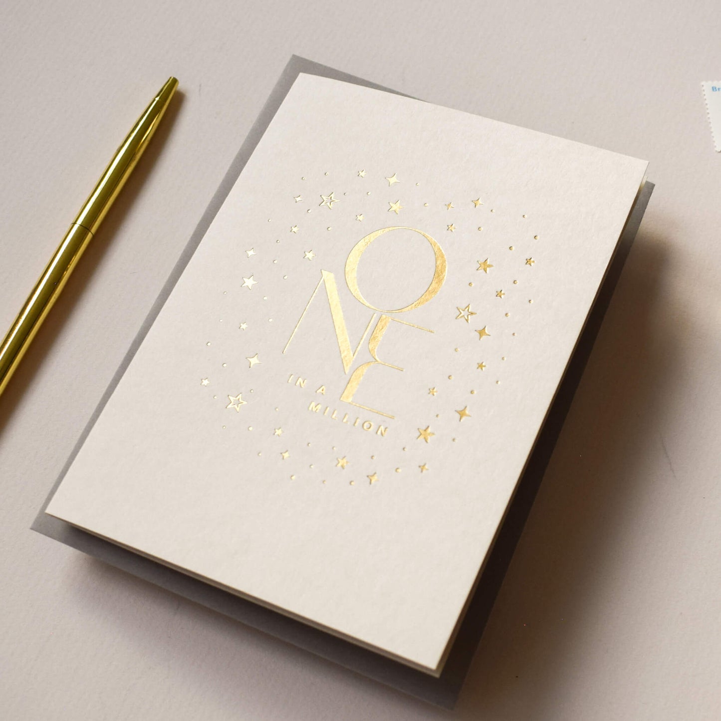 One In A Million Card in Gold Foil