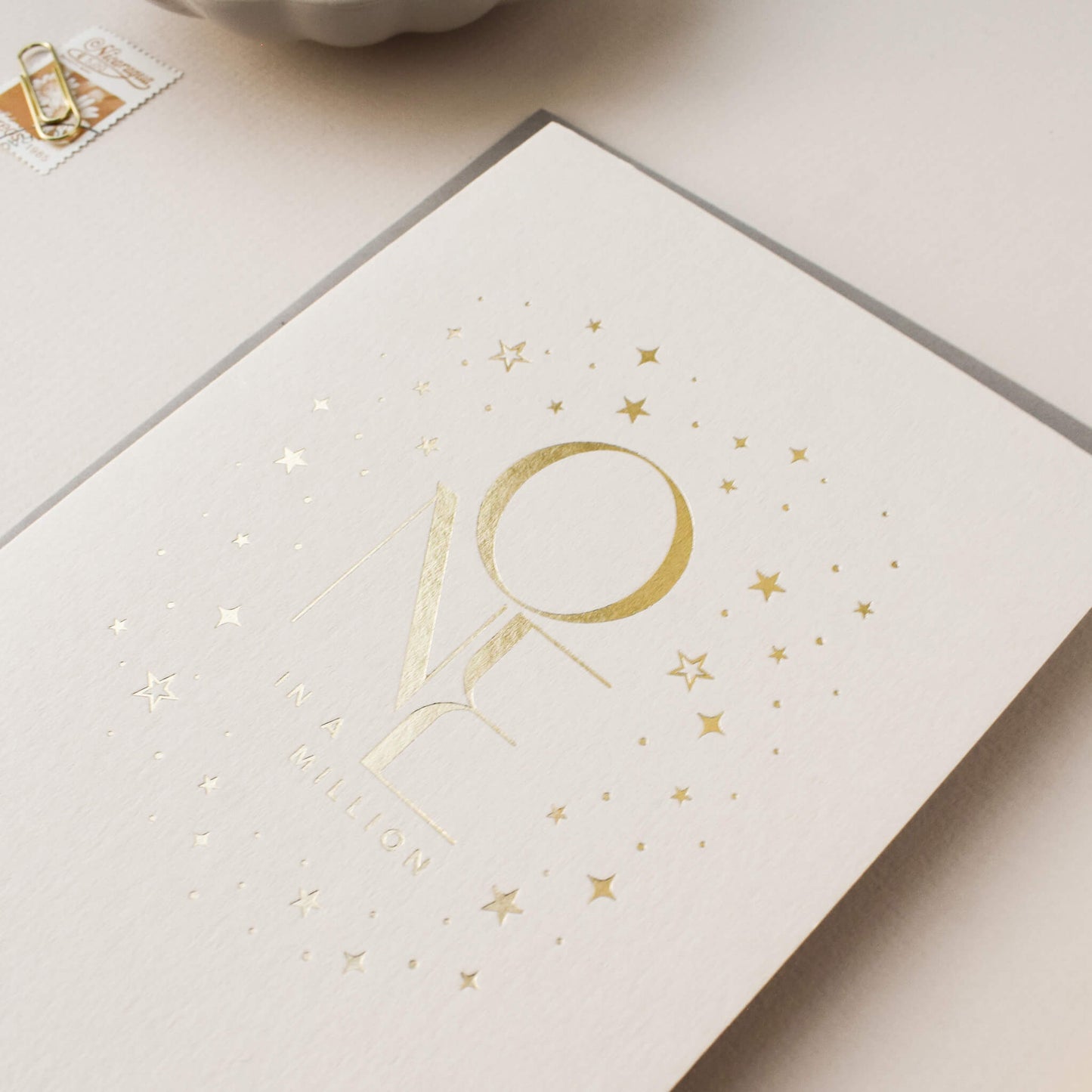 One In A Million Card in Gold Foil