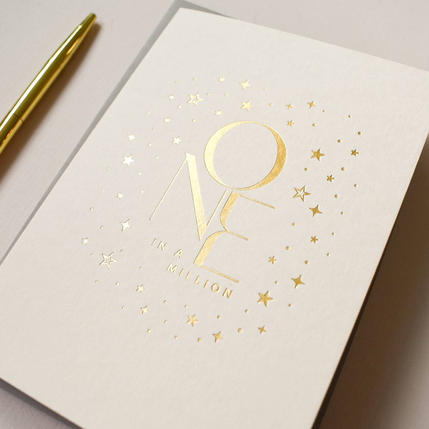 One In A Million Card in Gold Foil