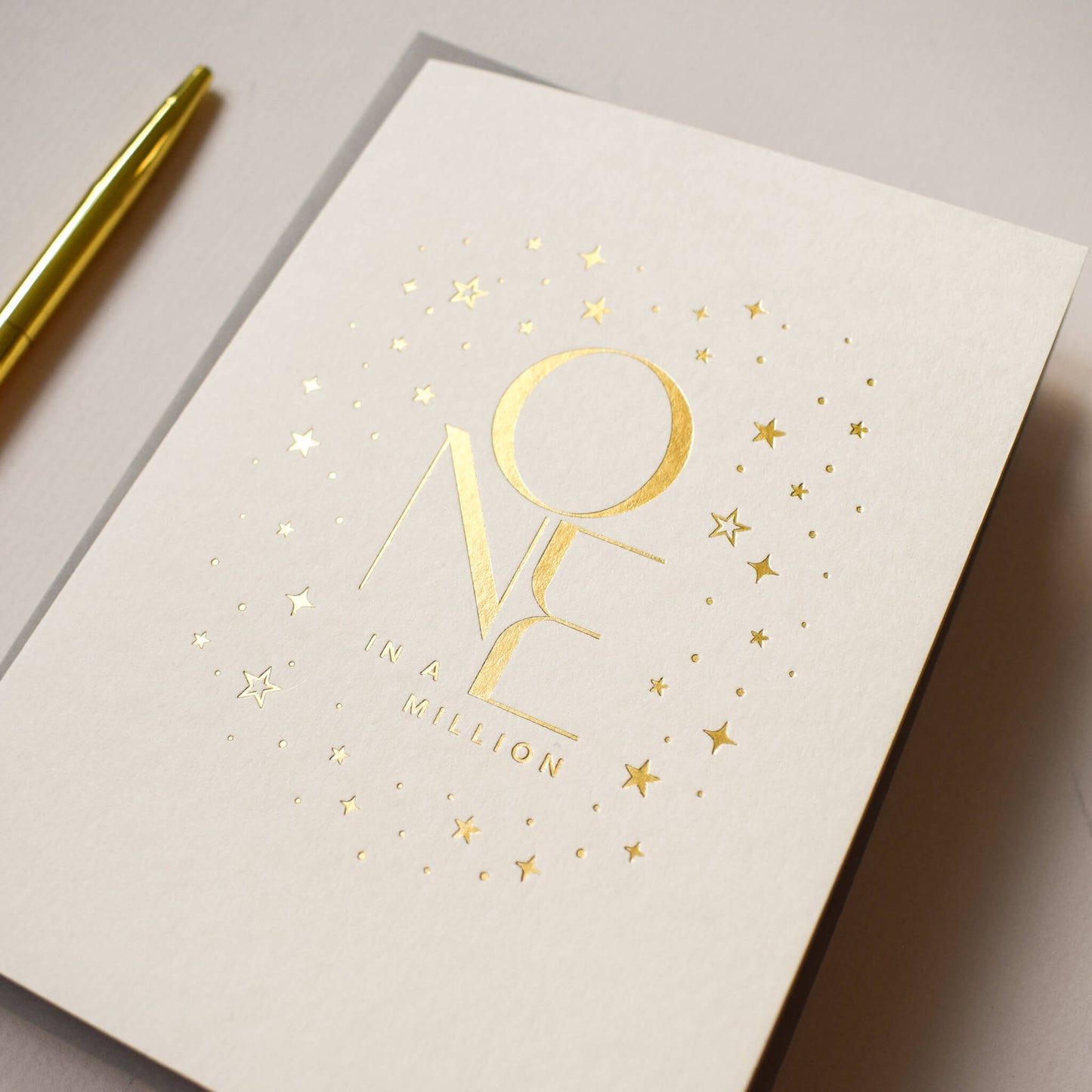 One In A Million Card in Gold Foil