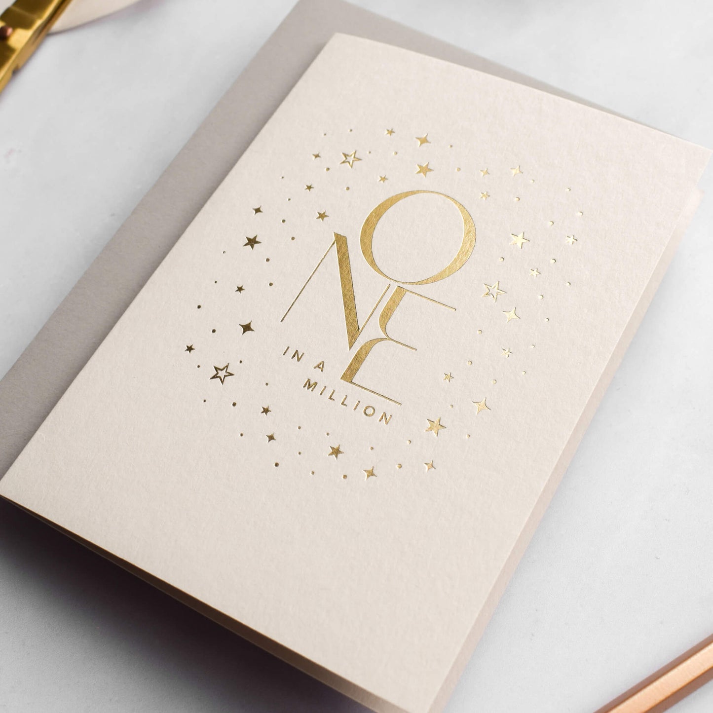 One In A Million Card in Gold Foil